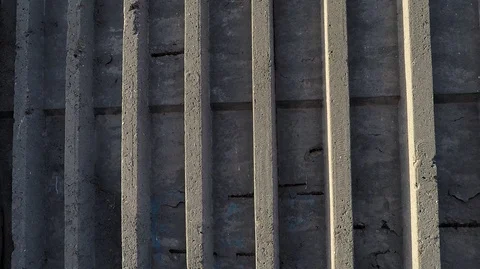 Vertical strips of concrete structures in the form of wall background texture Stock Footage 124762526