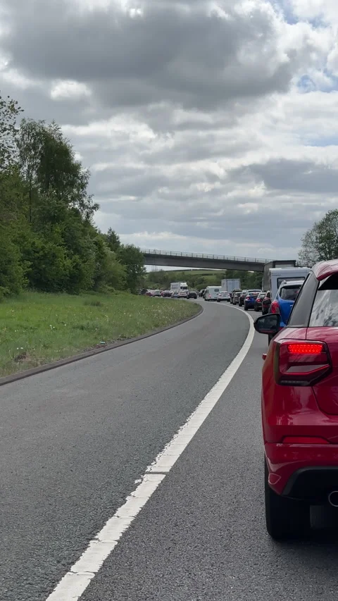 Vertical. Stuck in a long slow traffic queue on motorway M6 Stock Footage 309202767