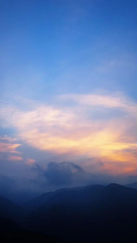 Vertical Sunset over silhouettes of mountain ranges in China Stock-Footage 333442962