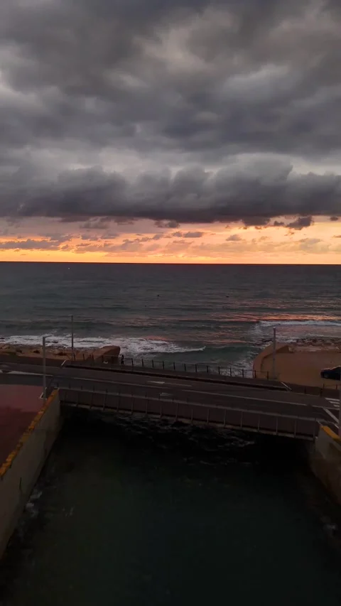 Vertical Sunset at Puerto de Javea Channel with Mediterranean Seascape 動画素材 337432001