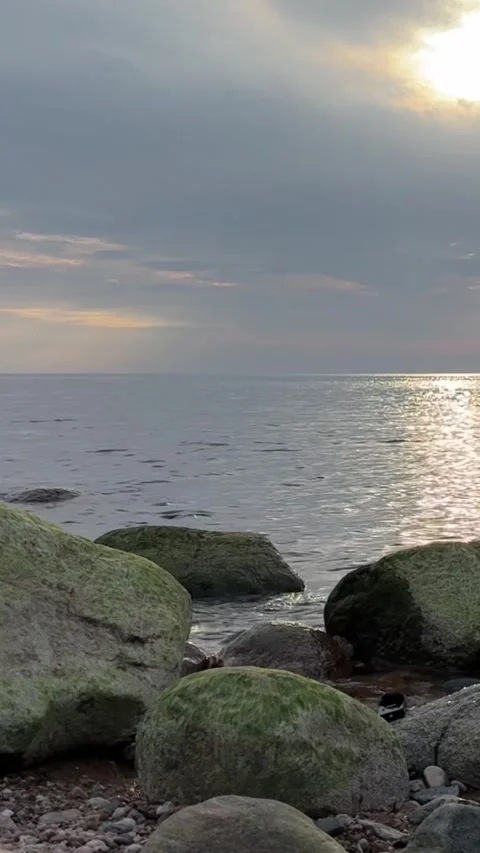 Vertical Sunset Sea with Mossy Rocks – 4K Vertical Stock Footage 320477435
