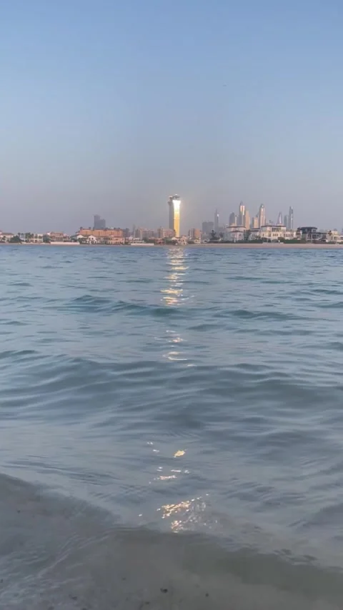 Vertical Sunset View of Aura Sky View Hotel Tower on Palm Jumeirah, Dubai Stock Footage 309403284