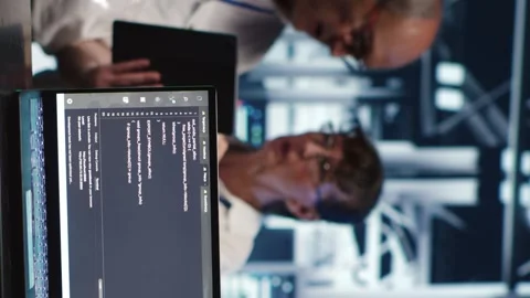 Vertical Supervisors running code in data center Video stock 247797278
