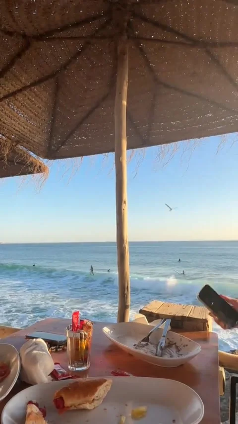 Vertical Surfing Beach View from a Cozy Cafe in Taghazout Morocco Stock Footage 330204549