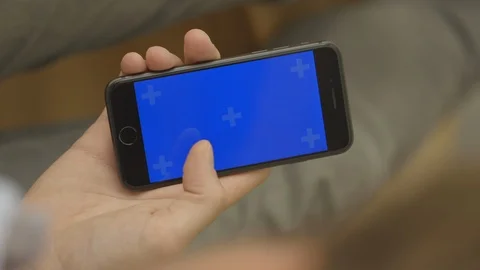Vertical Swipe on a Smart Phone, Touch Screen, Held By Hands. Chroma Key. Stock Footage