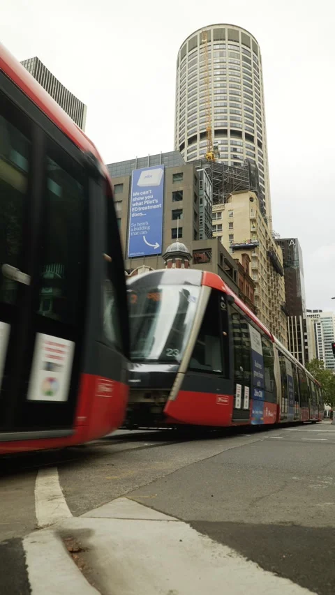 Vertical Sydney tram and fire engine through the streets of Sydney 6K Vidéo 306503737