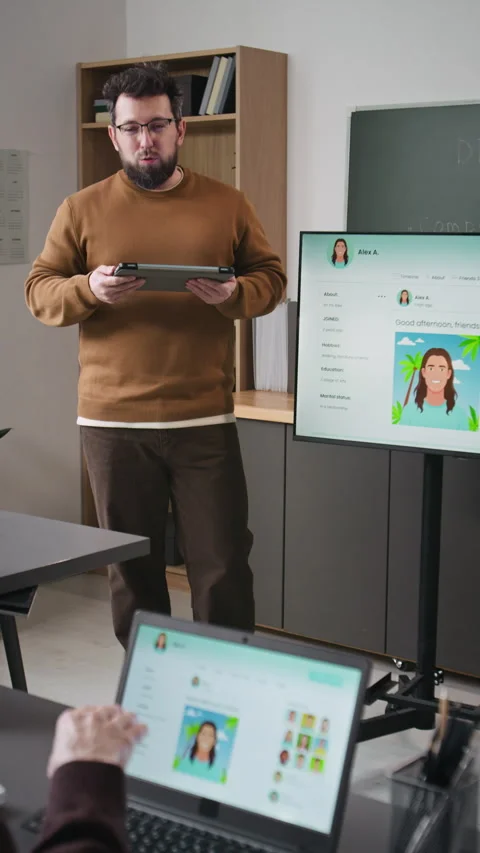 Vertical of Teacher Explaining Social Media in Computer Class Stock Footage 333708017