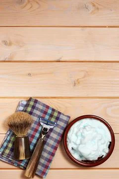 Vertical template with shaving equip, razor blade and brush and foam Stock Photos