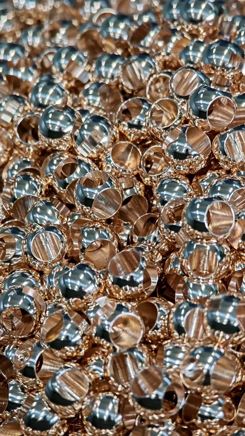 Vertical texture of brass nuts in macro photography. Abstract pattern of Stock Footage 329288582