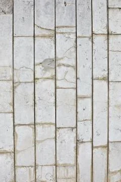 Vertical texture of gray tiles on the wall Stock Photos