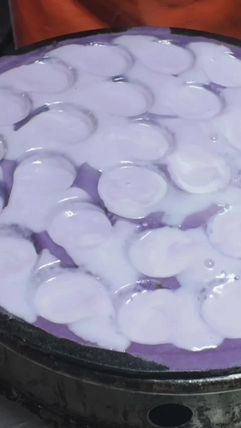 Vertical Thai Coconut Pancakes Steaming in Cast Iron Pan During Street Food Stock Footage 328213754