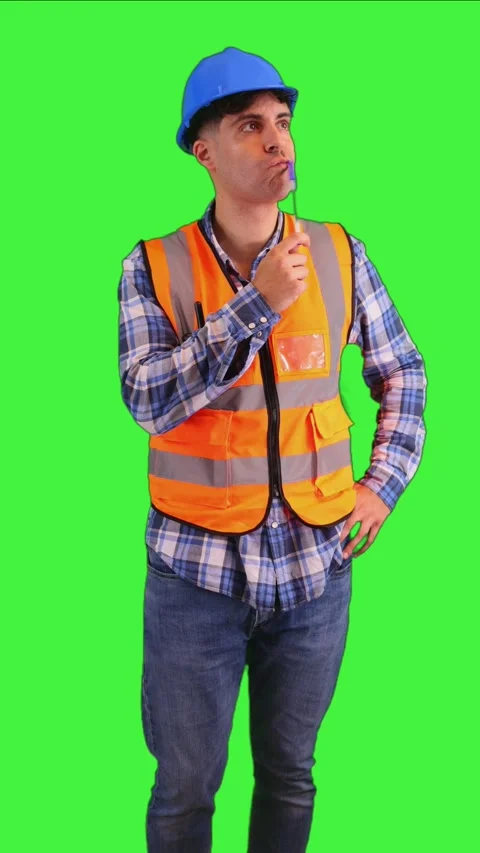 Vertical Thoughtful construction worker holding a pen while thinking, weari.. Stock Footage 287328024