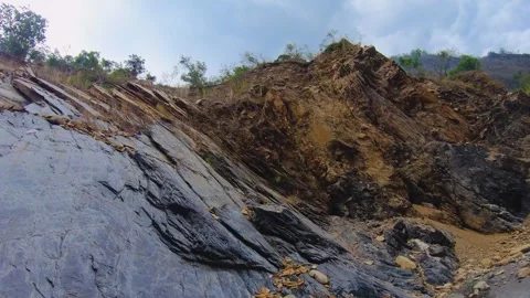 Vertical tiled view to mountains creek valley canyon hills with tree and brown g Stock-Footage 265493687