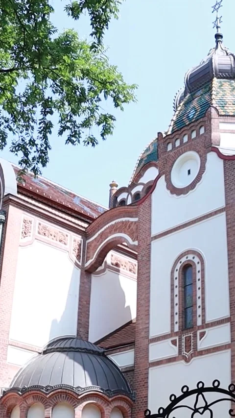 Vertical Tilt Down to Ornate Wrought Iron Synagogue Gate Video stock 330368877