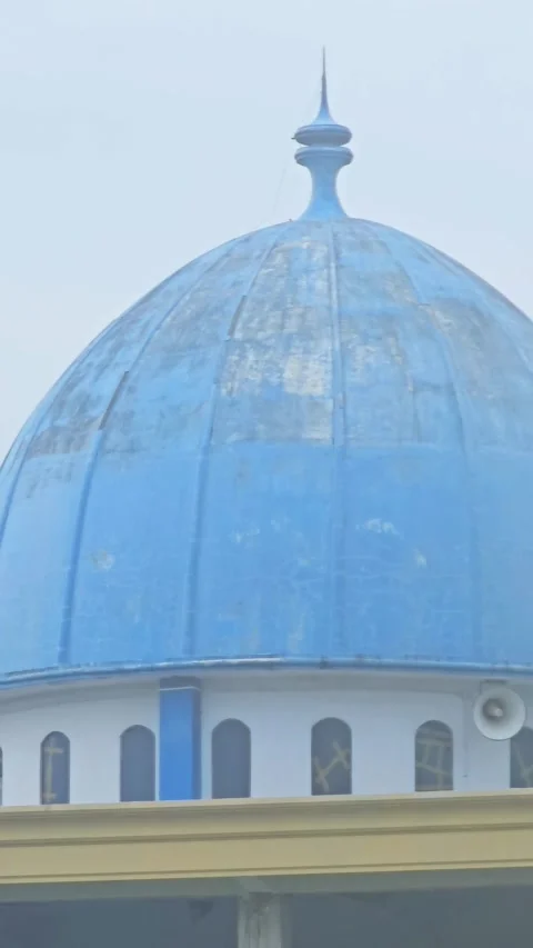 A vertical tilt-down view of a mosque currently under construction Stock Footage 332851999