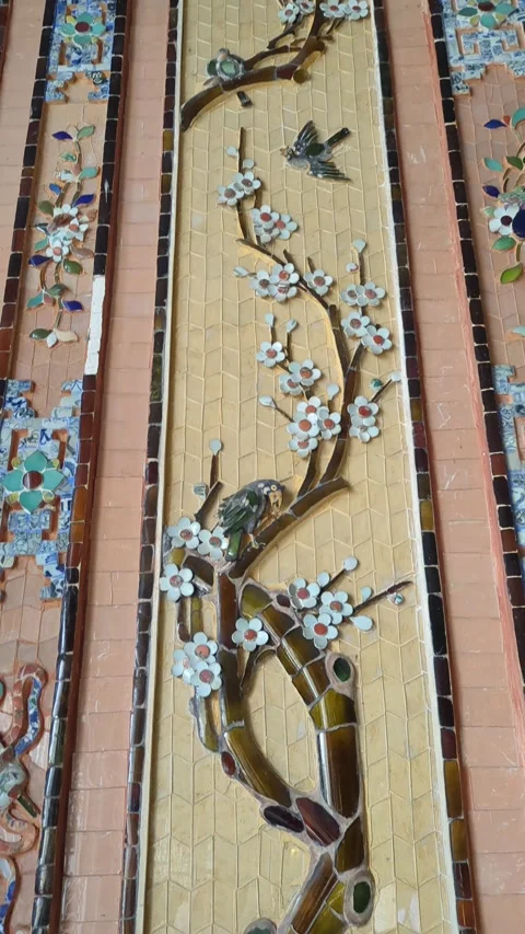 Vertical tilt shot of delicate patterns of porcelain mosaic art Stock Footage 313486373