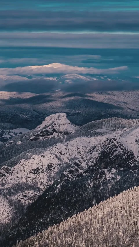 Vertical Time Lapse of Clouds Moving Over Snowy Alps Mountains Stock Footage 312236508