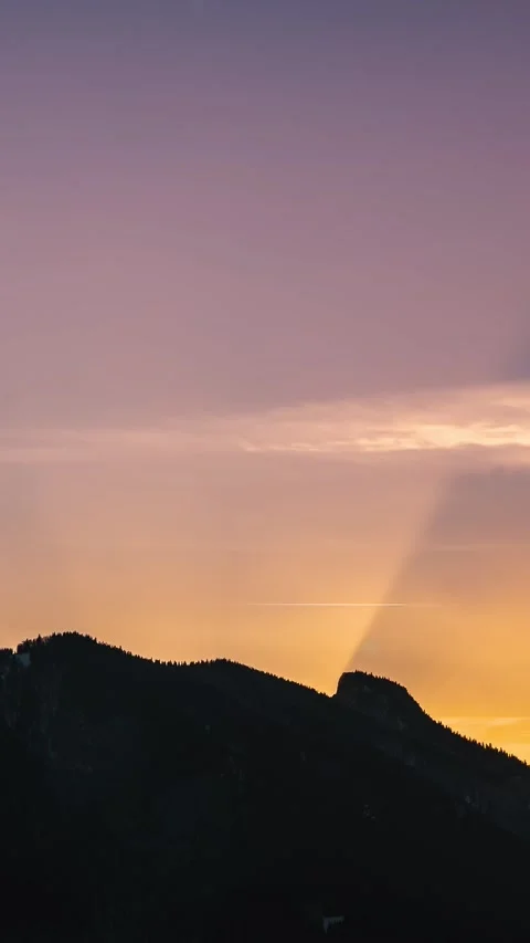 Vertical Time Lapse of Golden Sky over Forest Mountain Silhouette in Summer Video stock 312063509