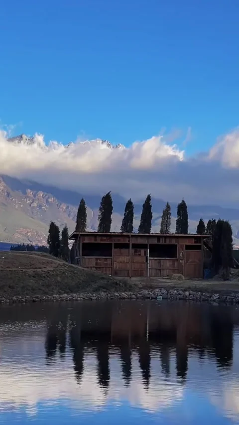 Vertical Time Lapse of Jade Dragon Snow Mountain with Lake Reflection and Mo Video stock 326092367