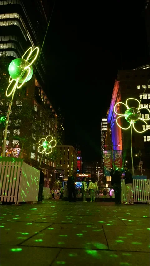 Vertical time lapse light rays and neon shapes at VIVID Sydney street 4K Stock Footage 310485148