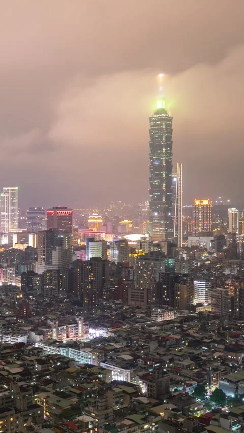 Vertical time Lapse of low clouds above Taipei Taiwan at night Video stock 337139904