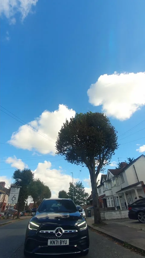 Vertical Time Lapse. Luton City Street View on Mostly Cloudy Day Stock Footage 318412008