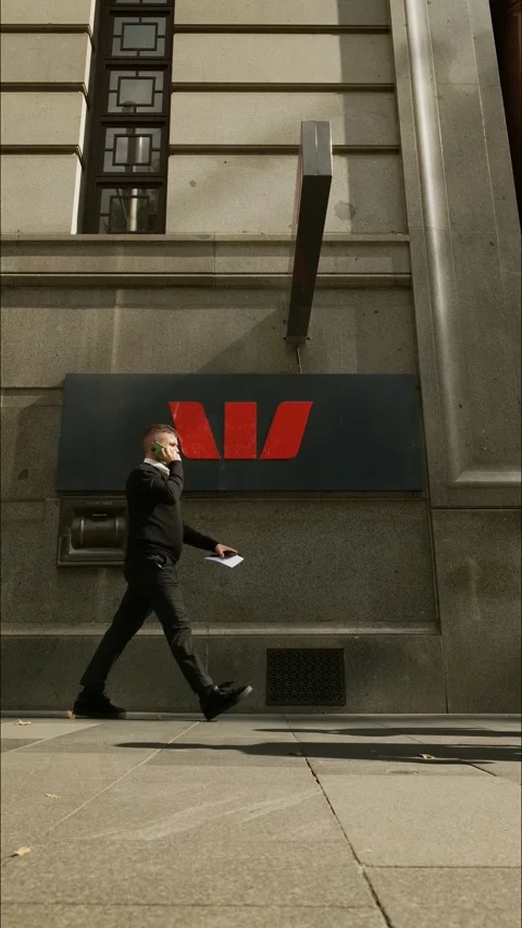 Vertical time lapse pedestrians pass Westpac Bank logo in Sydney 4K Stock Footage 308352453