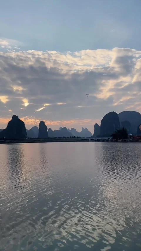 Vertical Time Lapse Powered Paraglider Flying Over Guilin Karst Mountains an Stock Footage 327051954