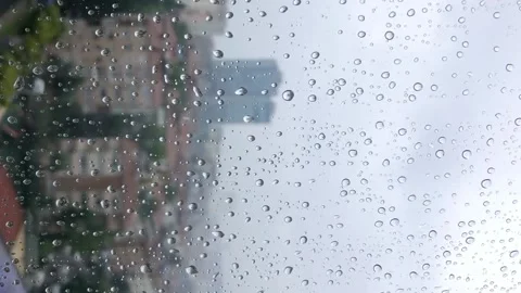 Vertical time lapse, rain drops on window pane Stock Footage 155888796