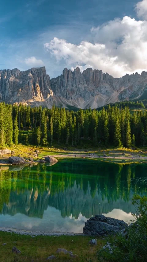 Vertical Time Lapse, Stunning Alpine Lake, Pine Forest and Clouds Above Italian Stock Footage 342074383