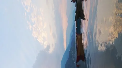 Vertical Time lapse stunning Phewa lake purple orange sunset panorama with .. Stock Footage 280576380
