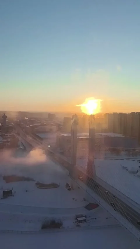 Vertical Time Lapse of Sunrise over Cable-Stayed Bridge in Frozen Winter Cit Stock Footage 326123802