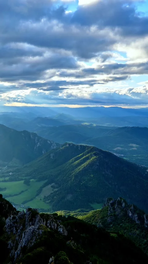 Vertical Time Lapse of Sunrise with Sun Rays in Magic Mountains, pan Video stock 293778484