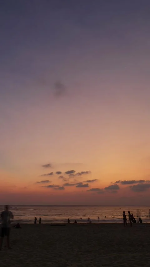 Vertical Time lapse of tropical white sand sea beach landscape with sunset Stock Footage 253386471
