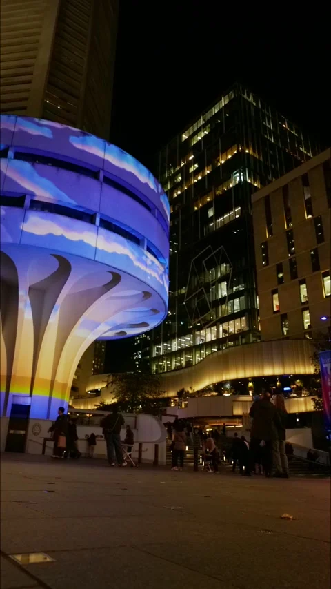 Vertical time lapse VIVID light show on modern Sydney architecture 4K Stock Footage 310496883