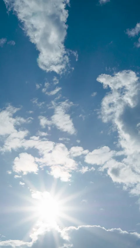 Vertical Timelapse Blue sky fluffy white clouds on summer season bright clear sk Stock Footage 278570779