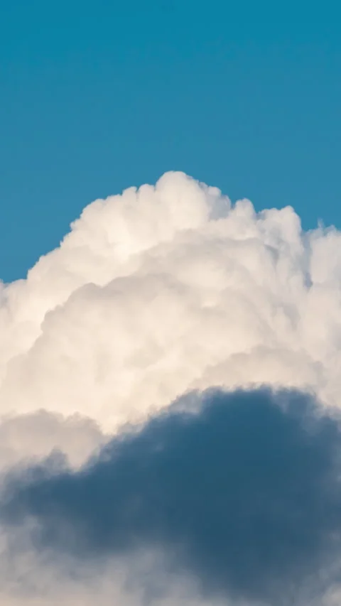 Vertical Timelapse Blue sky fluffy white clouds on summer season bright clear sk Stock Footage 278570916