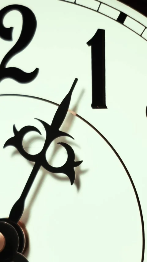 Vertical Timelapse Clock Face Passing One and Two Stock Footage 306642556