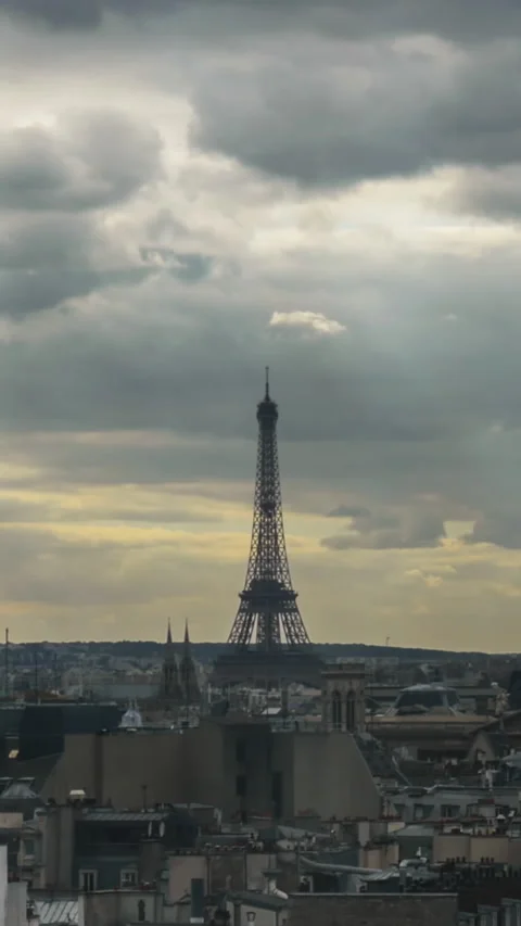 Vertical timelapse of clouds gathering over the Paris Stock Footage 243278235