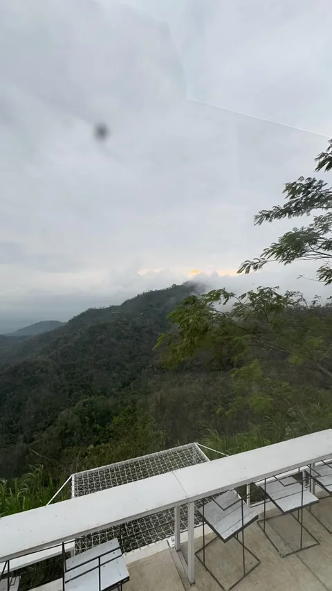 Vertical Timelapse of Cloudy Mountain Sunrise Over Forest in Yogyakarta Video stock 309174734