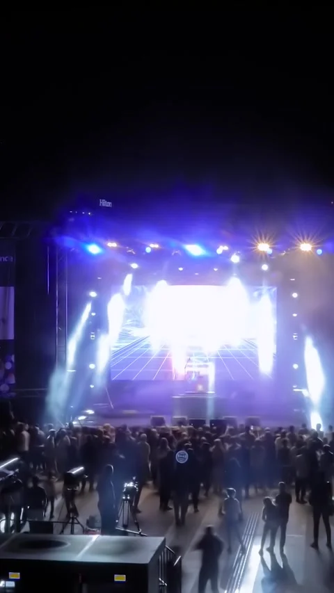 Vertical, timelapse: DJ set with fast flashing strobe stage lights at night Stock Footage 339028824