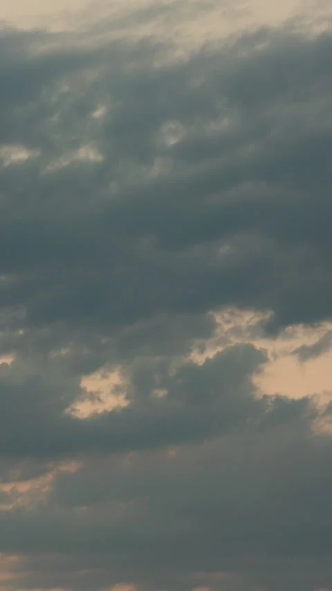 Vertical timelapse of dramatic sunset sky with fast moving cloudscape 4k Stock Footage 343450147