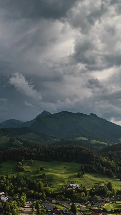 Vertical Timelapse of Storm Clouds Over European Countryside in Spring Nature Stock Footage 310802706