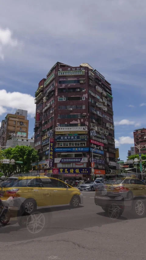 Vertical timelapse street view at intersection with pedestrian buses and ca.. Stock Footage 253386578