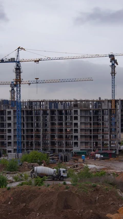 Vertical Timelapse of Tower Cranes Building Residential Complex Urban Devel.. Stock Footage 311160125