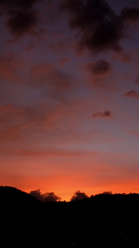 Vertical timelapse video of red sky at sunset Stock Footage 336877798