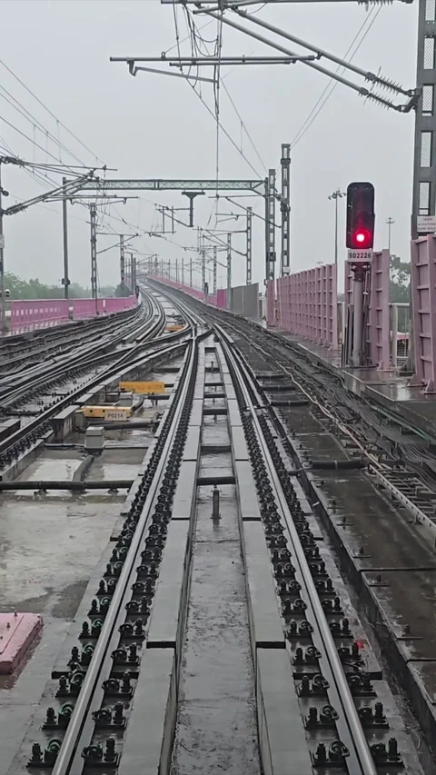 Vertical Timelapse View of Delhi Metro Tracks in Rain, Delhi Stock Footage 341939777