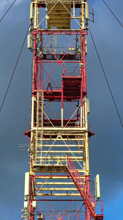 Vertical Timelapse with Zoom In on Red Industrial Tower Stock Footage 337689234