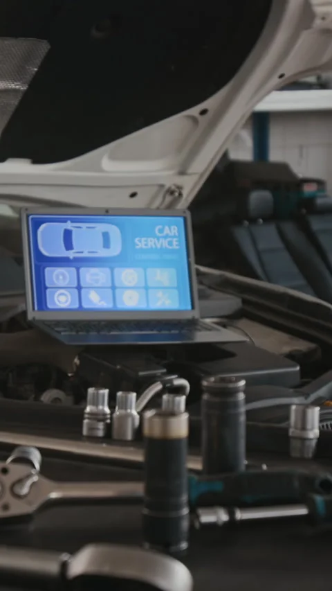 Vertical of Tool Cart and Laptop with Car Engine Diagnostics Program Vídeo Stock 329439979