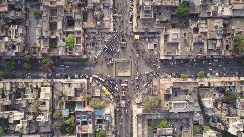 Vertical Top angle aerial drone shot of congested traffic on crossroads in city. Stock Footage 249836489